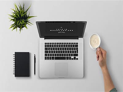 Workplace. Laptop. Notebook. Pen. Coffee