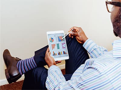 A man works with a tablet